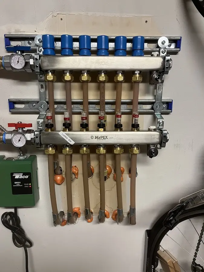 Plumber performing Water Heater Repair at a residential property in Duvall